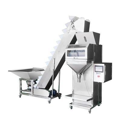 China Automatic Food Tea Nuts Filling Granule Sugar and Rice Cashew Candy Vertical Packaging Machine for sale