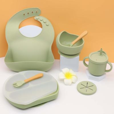 China Modern 7pcs Kids Dinnerware Sets Biodegradable Baby Bibs Roll Dishes Spoon Fork Straw Cup Anti-Drop Silicone Baby Feeding Set for sale