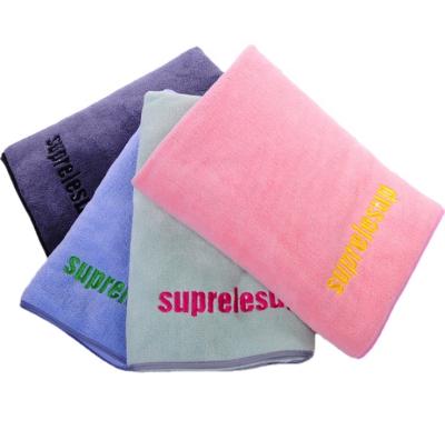 China Viable Embossed Printed Bath Towel For Women Microfiber Fleece Towel Simple And Soft Baby Wrap Coral Hooded Cloth for sale