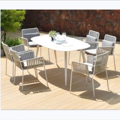 China Hot Selling Waterproof Outdoor Garden Dining Table Wooden Plastic Dining Table With Chair Picnic Table for sale