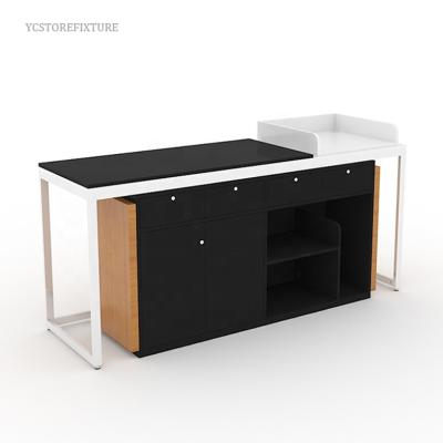 China Eco - Friendly Custom Design Wooden Clothing Store Checkout Counter Cashier Desk for sale