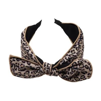 China Korean version of luxury brand designer solid color r wash leopard print headband central institute of statistics female leather simple temperament headband for sale