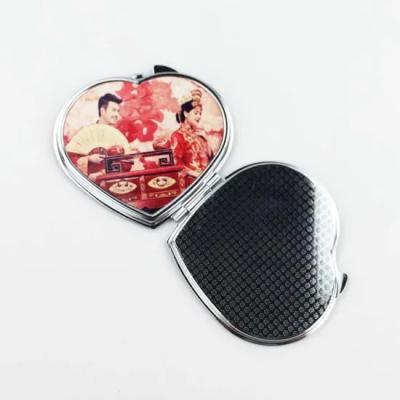 China Empty Pocket Mirror Sublimation Heart Shape Makeup Mirror For Pritnting Heat Transfer for sale