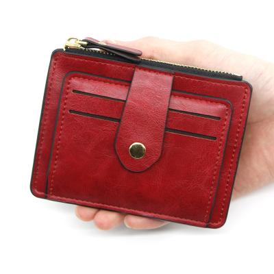 China Cartera para hombres y mujeres Unisex de color puro de cuero Pu bolso de moneda en venta