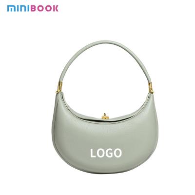 China Stylish Lady's Real Leather Crescent Shape Bag Magnetic Clasp and Inside Zipper Pocket for sale