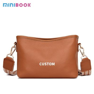 China Single Strap Genuine Leather Women's Sling Shoulder Messenger Bags with Wide Shoulder for sale