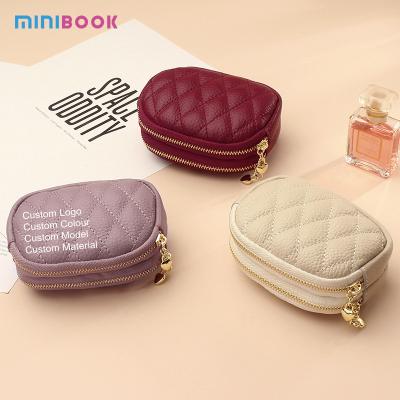 China Double Zipper Large Capacity Keychain Pouch for Women Made of Genuine Cowhide Leather for sale