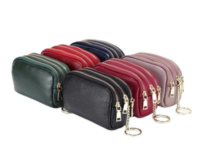 中国 Genuine Leather Purse Three Zip Coin Bag Multi-function Key Bag Wallet Ideal for Daily 販売のため