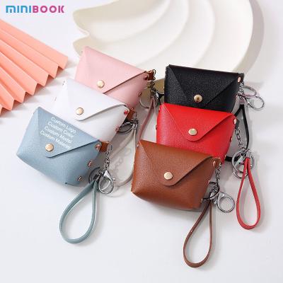 Cina Customized Logo Genuine Leather Minibook Coin Purse for Coin Lanyard Bag in vendita