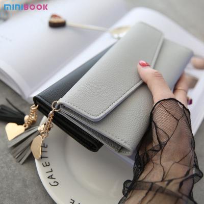 China Solid Colors PU Leather Women Wallets Luxury Long Hasp Fold-over Pattern Coin Purses for sale