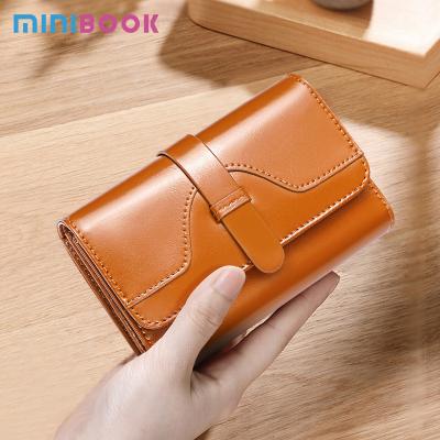 China Women's Wallet Genuine Leather Clutch Money Bag Short Gender Women Vintage Card Holder for sale