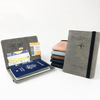 China Custom Logo Avaliable Durable Eco Friendly Passport Holder with Sim Pocket Band Strap for sale