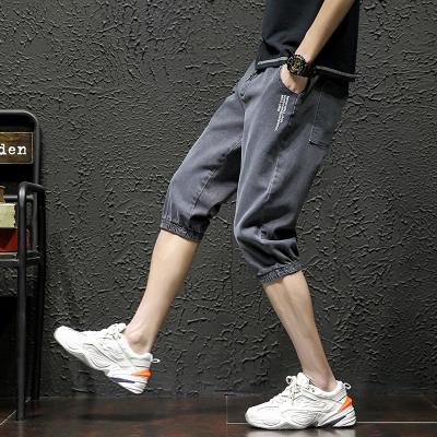 China Breathable Summer Pants Youth Sports Loose Student 7 Point Pants Short Men's Casual Briefs for sale