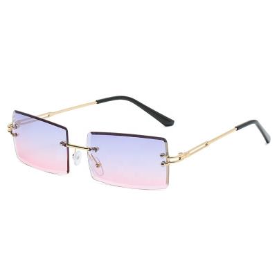 China Luxury Tinted Glass Women's Fashion Sun Glasses Female Square Rectangle Rimless Sunglasses for sale