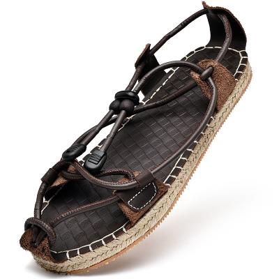 China Summer Personality Trend Sandals and Slippers Cowhide Woven Sandal Top Layer Breathable Men's Straw Sandals for sale