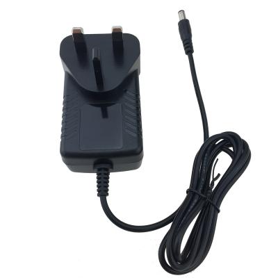 China Factory price ABS+PC flame retardant material UKCA passed 100-240vac 24volt 24w 24v1a dc power supply charger 24v 1a UK plug adapter ac dc adapter for led box for sale