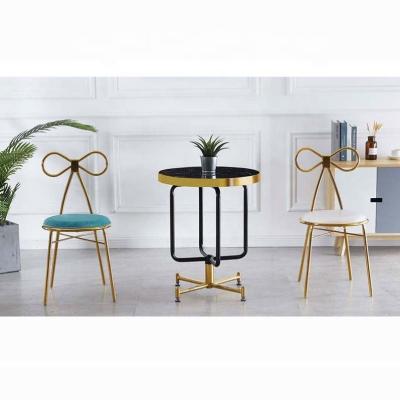 China Hot Selling Morden Style Modern Simple Butterfly Chair Gold Metal Plated Legs Dining Table And Chairs With 2chair for sale