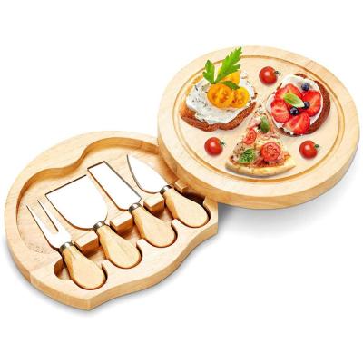 China Sustainable Factory Environmentally Friendly 100% Wooden Round Cheese Cutting Board Set With 4 Pieces Set Cheese Knives For Gift for sale