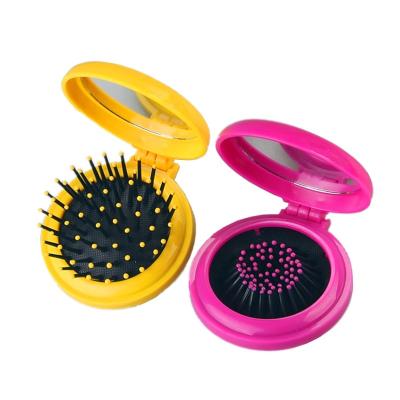 China Hot Sale Portable+Folding+multi fuction Folding Makeup Mirror Comb Travel Portable Round Plastic Hair Brush Comb With Mirror for sale