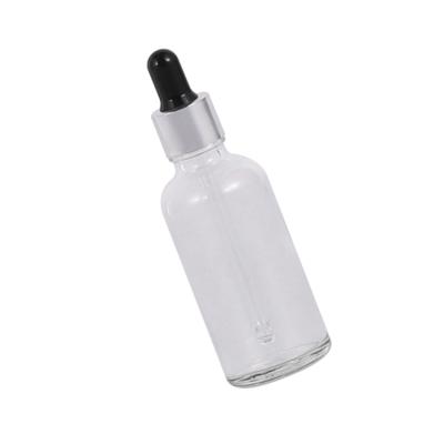 China Hot Transparent 30ml Personal Care Essential Oil Bottles Glass Dropper Bottle With Black Rubber Head for sale