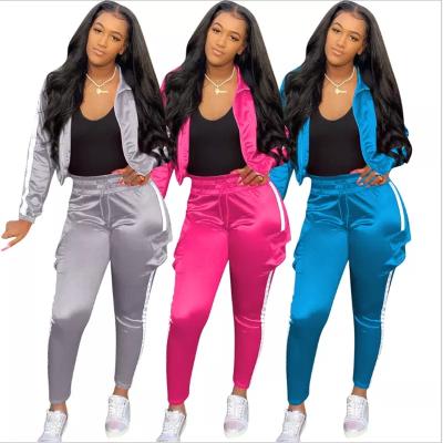 China QUICK DRY patchwork reflective brand 2 piece set women tracksuit jacket pants set two piece woman sport wear jogging matching set for sale