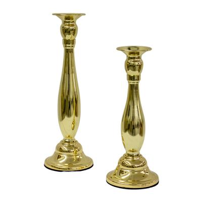 China Luxury retro romantic conical candle holder metal gold menorah candle holder decoration candlestick holders for sale