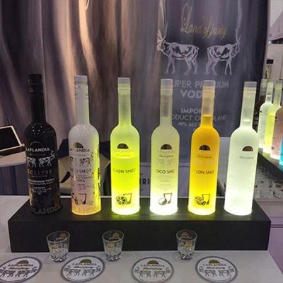 China Custom Size Bottle Presenter LED Acrylic Display Champagne Bottle Glorifier for sale