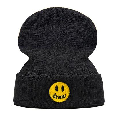 China COMMON winter knitted beanie hat for unisex adults smile face embroidery knitted beanie hat winter warm hat for sale