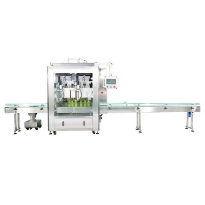 China Beverage factory direct supply of high quality toothpaste double heads tracking type filling machine for 40-50 bottles per minute for sale