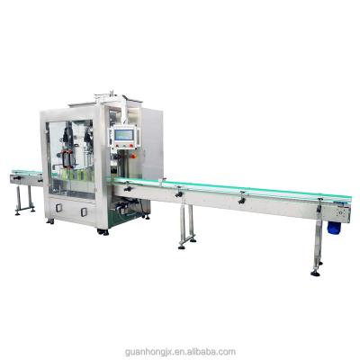 China Beverage Double Heads Automatic Following Type Capping Machine for sale