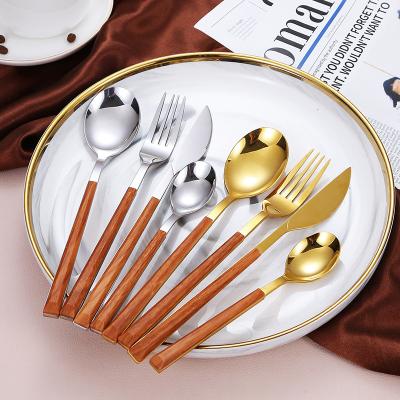 China Viable Hot Sale Vintage Wooden Gold Marble Gold Design Table Black Stainless Steel Flatware Sets Kitchen Cutlery Set for sale