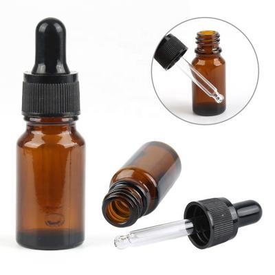 China Non Spill Stock 10ml cosmetic glass dropper bottles european amber essential oil bottle for sale