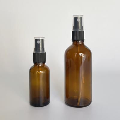 China Non Spill Empty amber cosmetic refillable glass perfume bottles with mist sprayer for sale