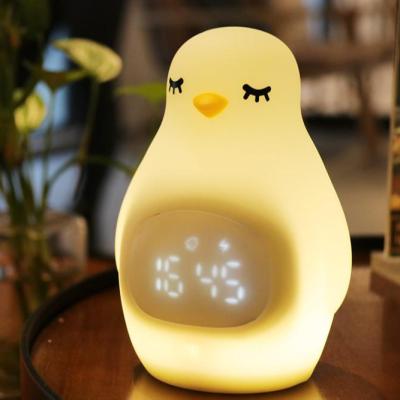 China Cute Silicone Penguin NightLight for Children LED Sleep Trainer Alarm Clock Gift for sale