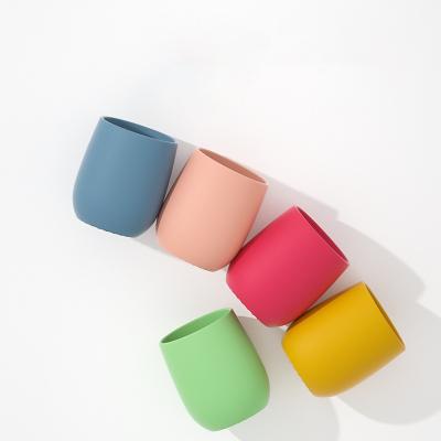 Cina Logo personalizzato accettabile 60 * 65MM Tazza da bere in silicone Tazza di qualità alimentare per bambini in vendita