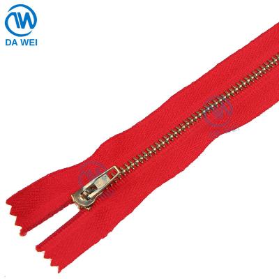 China DAWEI Brand 3# Metal Zipper Custom High Quality Semi-lock Spring Head 3# End Head Normal Brass Teeth for sale