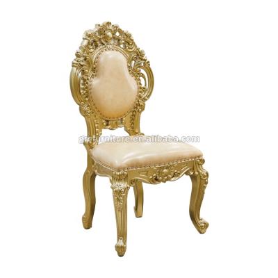 China Classic Design Luxurious Golden Carved Solid Wood Leather Dining Chair Set for sale