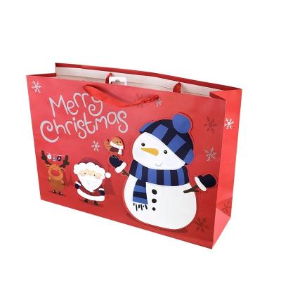 China Recyclable Small Colorful Craft Gift Christmas 3D Handle Kraft Paper Die Cut Paper Bag for sale