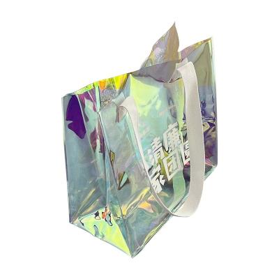 China Transparent Iridescent PVC Tote Bag Clear Laser Handbag Hologram Security Fashion Shopping Bag Gift Bags for sale