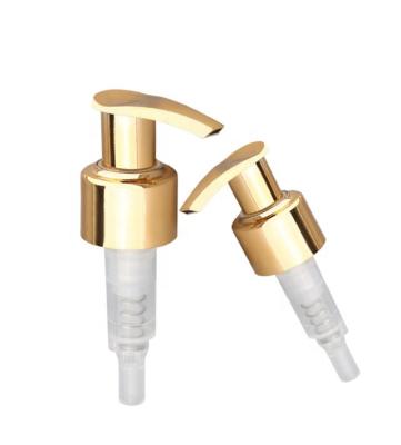 China Non Reverse 24/410 Gold Aluminum Gold Lotion Dispenser Pump Glossy Lock Right To Left Pump for sale