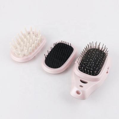 China Nondisposable HM620 Travel Use Battery Powered Portable Compact Mini Ionic Hair Brush for sale