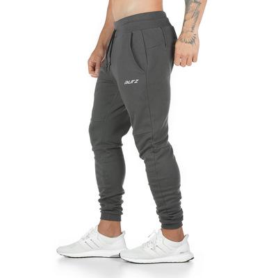 China Hot Selling QUICK DRY Mens Pocket Joggers Elastic Stacked Sweatpants Sports Pants With Suction String for sale