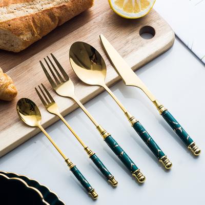 China New Stainless Steel Viable Western Household Dessert Household Ceramic Fork Knife Spoon Handle Flatware Set for sale