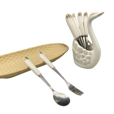 China Sustainable Dinnerware Set Ceramic Handle Stainless Steel Spoon Fork Multi Color Reusable Flat Dinnerware With Swan Box for sale