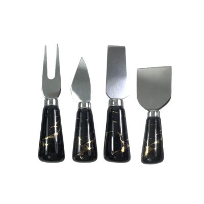 China Sustainable Set Wholesale Four-piece Stainless Steel Porcelain Handle Cheese Fork Butter Knife Western Tableware for sale