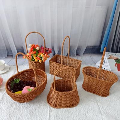 China Sustainable Handmade Wicker Planter Basket With Handle  Candy Bread Woven Storage Basket Rattan Flower Basket For Home Wedding Decoration for sale