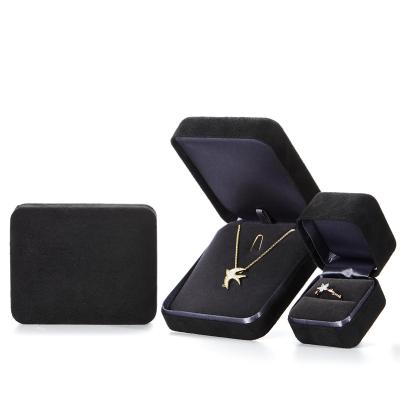 China Handmade Ring Box High End Metal With Logo Slider Microfiber Black Gift Paper Bag Dark Blue Jewelry Box for sale