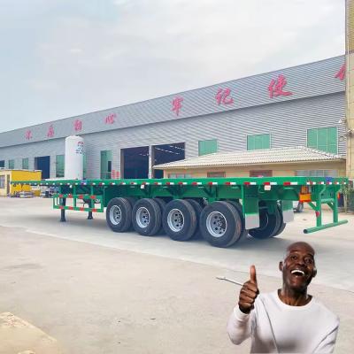 China Semirremolques de 3 ejes y 4 ejes semirremolques de piso plano para el transporte de materiales de construcción en venta