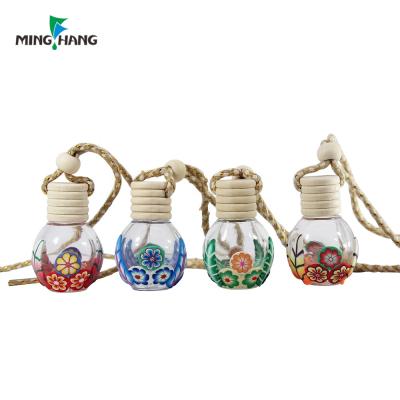 China Wholesale 10ml Mini Empty Decoration Empty Perfume Recyclable Material Car Air Hanging Glass Perfume Bottle With Hang for sale