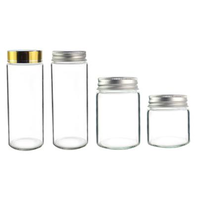 China Recyclable Custom Clear Borosilicate Glass Spice Hemp Candy Packing Bottle With Screw Cap for sale